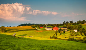 Evening light on farms and rolling hills in Southern York County, Pennsylvania.