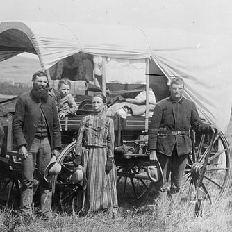 A Family Traveling by Wagon